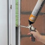 sealant for doors.Polyurethane PU foam spray for insulating and sealing construction gaps and joints.